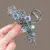 Imported black alloy hair clips with beautiful blue flowers.